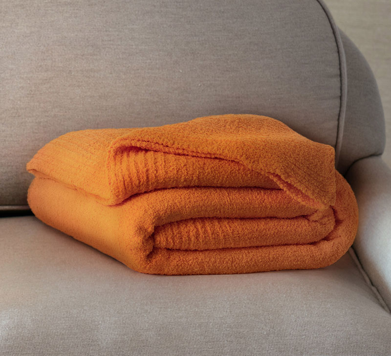 Orange throw blanket